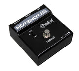 Radial HotShot DM-1 dynamic microphone switcher with a momentary toggle footswitch left side